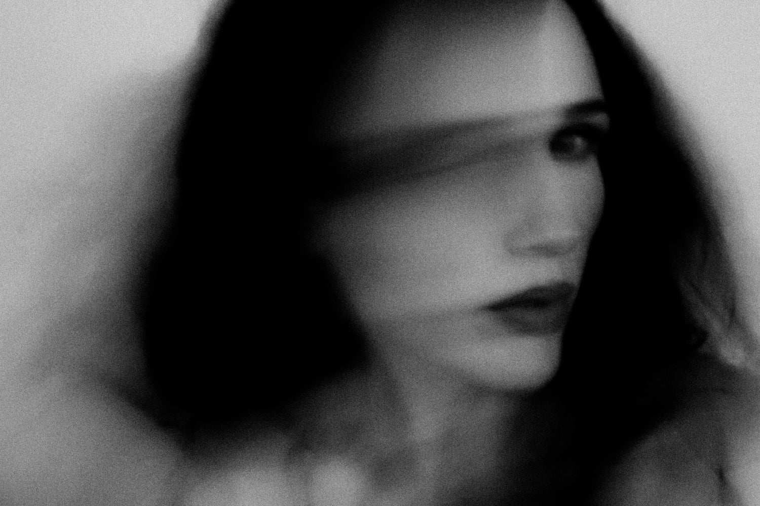 self portrait of artist - bnw digital photography -motion blur, long exposure.